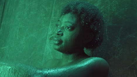 Thoughtful-African-American-Woman-Standing-in-Shower